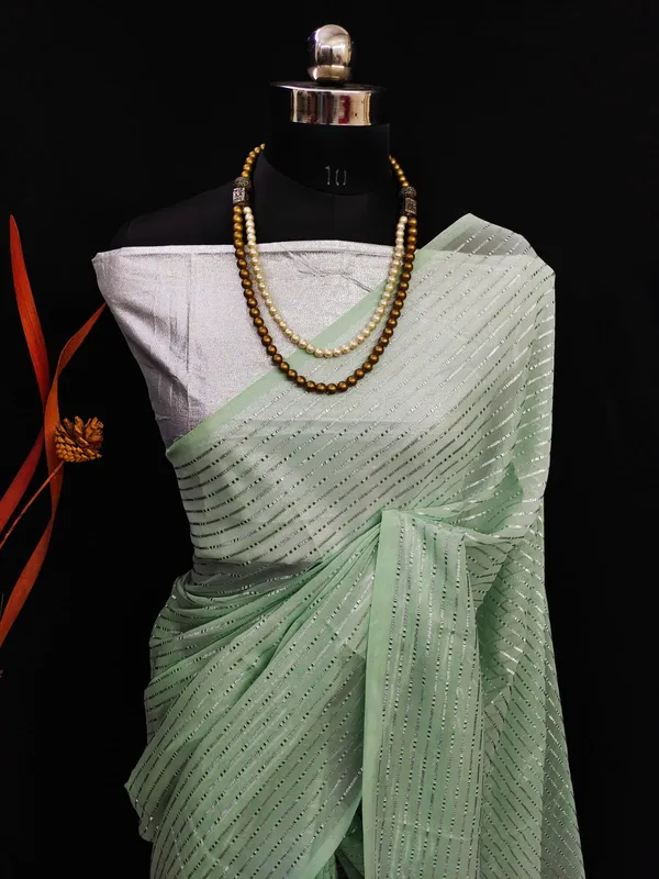 Georgette_Green_Solid_Zari_Striped_Saree_With_Silver_Blouse