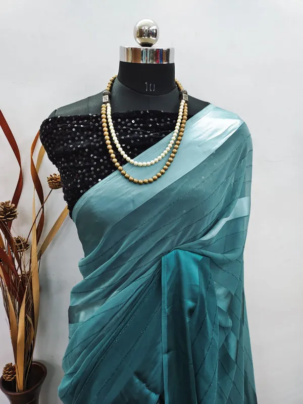 Georgette_Solid_Teal_Blue_Saree_With_Embroidery_Blouse