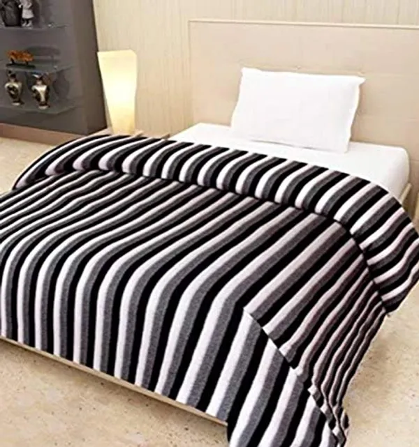 https://d1311wbk6unapo.cloudfront.net/NushopCatalogue/tr:f-webp,w-600,fo-auto/Global_Home_Stripad_Fleece_Blanket_For_AC_Room__Polyester_Black__KTI6KQVW48_2022-09-09_1.jpg__Goodprize