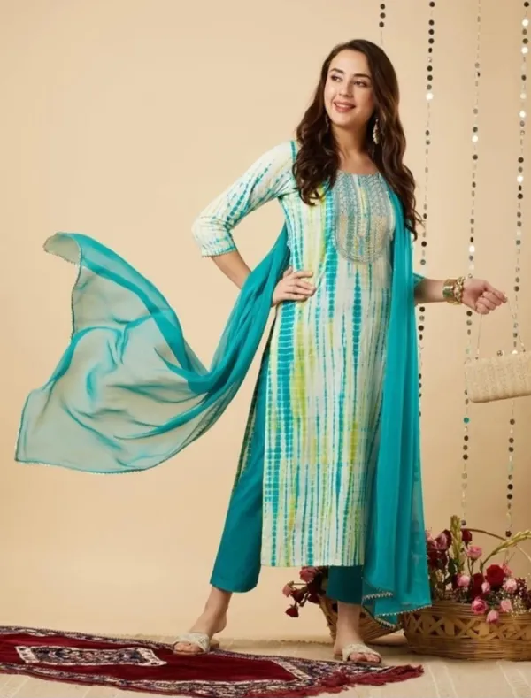 https://d1311wbk6unapo.cloudfront.net/NushopCatalogue/tr:f-webp,w-600,fo-auto/Green_color_kurti_with_dupatta_and_pant_set_FE3U7HOP5T_2024-07-06_3.jpeg__Rajdulari