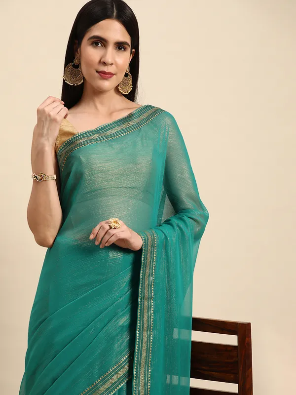 Indian_Women_Turquoise_Green_Chiffon_Georgette_Foil_Work