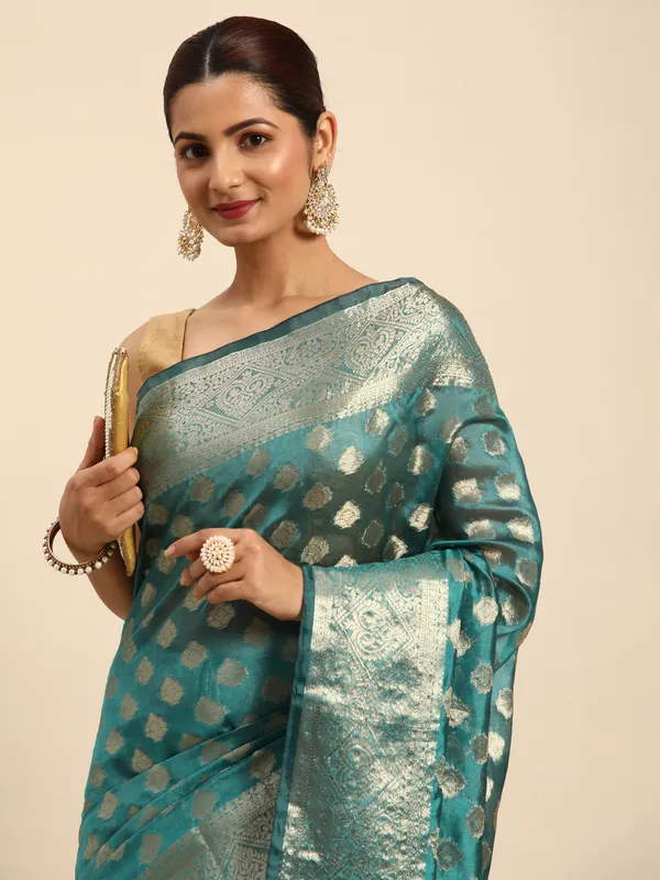 Indian_Women_Teal_Blue_Organza_Silk_Land_Woven_Design_Zari_Pure_Cotton_Fusion_Saree