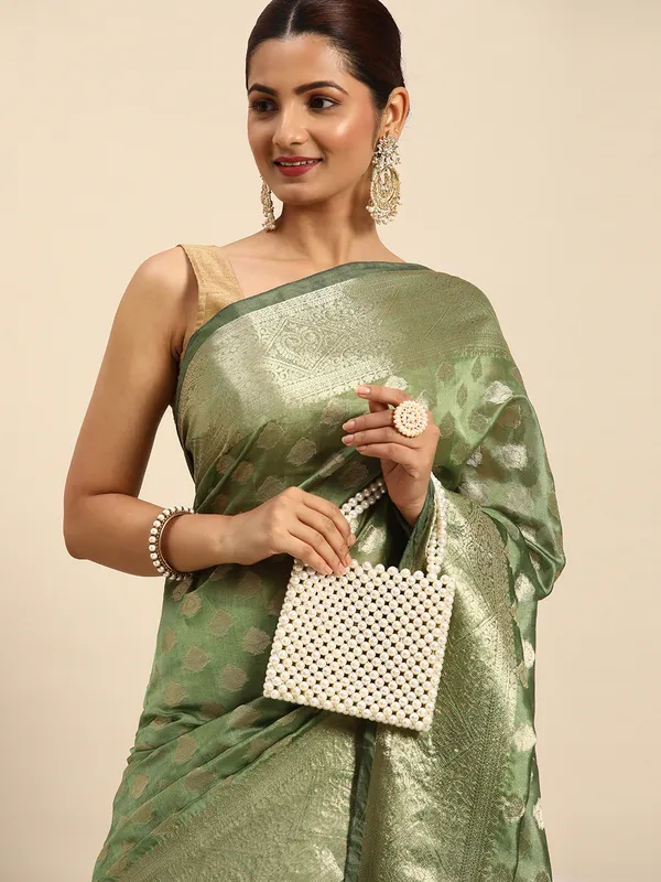 Indian_Women_Green_Organza_Silk_Land_Woven_Design_Zari_Pure_Cotton_Fusion_Saree