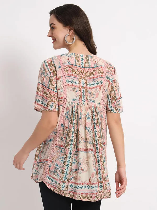 Pink_Beautiful_Floral_Printed_Longline_Top_with_Tie-Up_Neck_&_Flared_Sleeves_For_Women