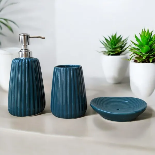 https://d1311wbk6unapo.cloudfront.net/NushopCatalogue/tr:f-webp,w-600,fo-auto/Handcrafted_Ceramic_Bathroom_Accessories_Set_in_Aqua_Green___Includes_Liquid_Soap_Dispenser__Soap_Tray__and_Toothbrush_Holder_for_Utility_and_Bathroom_Decor_58CYDJOGAS_2024-07-25_1.jpeg__Madarks