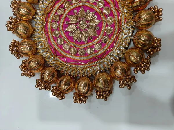 https://d1311wbk6unapo.cloudfront.net/NushopCatalogue/tr:f-webp,w-600,fo-auto/Handmade_Decorative_Gota_Ball_Patch__Pooja_Thali__Puja_Plate__Decoratve_Pooja_Plates_for_Festivals__Pink__RDB916KHQE_2024-08-01_1.jpeg__Nutts