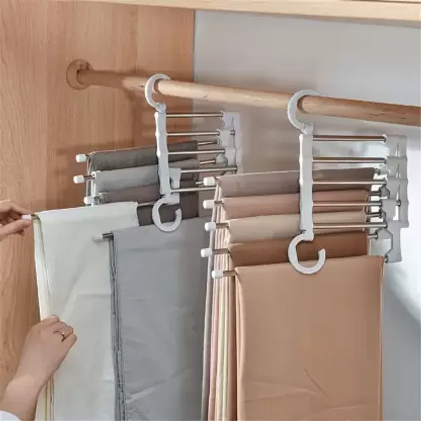 https://d1311wbk6unapo.cloudfront.net/NushopCatalogue/tr:f-webp,w-600,fo-auto/Hanger-_5_Layer_Hanger_Space_Saving_Non-Slip_Cloth_Organizer___5_In_1_Multifunctional_Layer_Pant_Rack_For_Trouser_Scarf_And_Travel_Storage_YL49IUD6MK_2023-10-19_1.jpg__AD Enterprise 