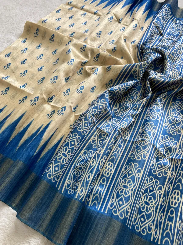 Manjusha_Blue_–_Treasured_Navratri_Special_|_Soft_Tussar_Silk_Saree_with_Print,_Border_&_Contrast_Print_Blouse_with_Tassels