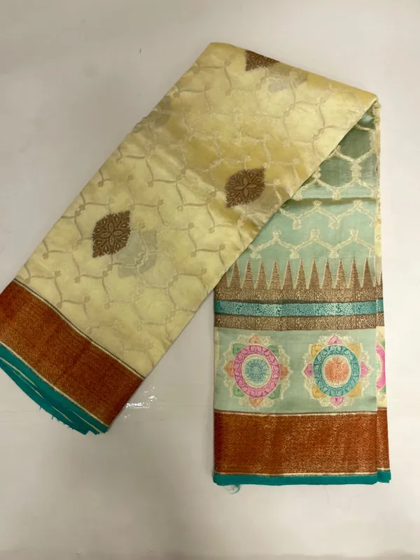 Humairah_Pure_Handloom_Lemon_Yellow_Dupion_Silk_Copper_Zari_Boota_Alfi_Zari_Jaal_with_Contrast_Orange_Pallu_and_Skirt_Rangkaat_Boota_Border_with_Sea_Green_Blouse
