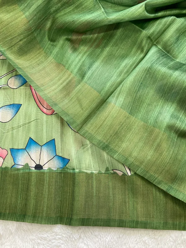 Darika_Green_–_Navratri_Special_|_Soft_Tussar_Silk_Saree_with_Print,_Pallu_&_Zari_Border_&_Contrast_Print_Blouse_with_Tassels