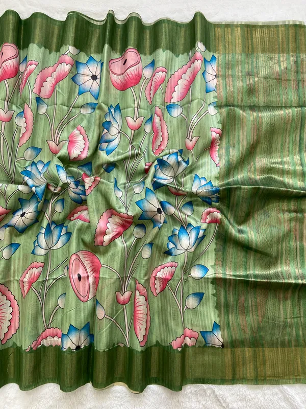 Darika_Green_–_Navratri_Special_|_Soft_Tussar_Silk_Saree_with_Print,_Pallu_&_Zari_Border_&_Contrast_Print_Blouse_with_Tassels