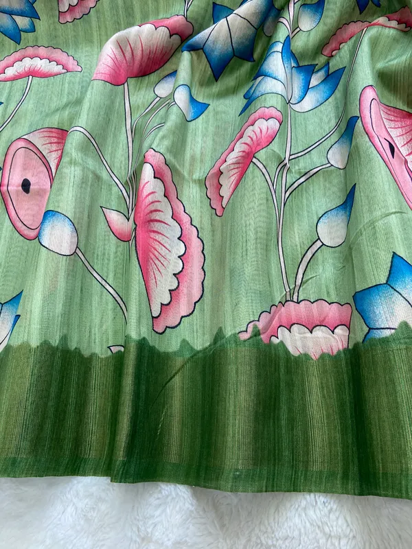 Darika_Green_–_Navratri_Special_|_Soft_Tussar_Silk_Saree_with_Print,_Pallu_&_Zari_Border_&_Contrast_Print_Blouse_with_Tassels