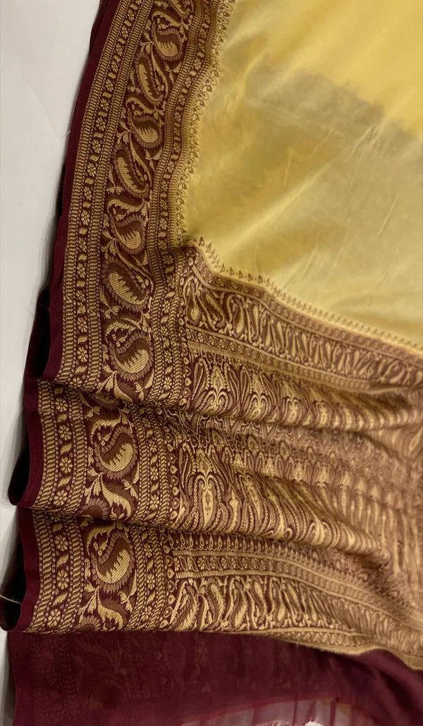 Humairah_Presents_Pure_Handloom_Lemon_Yellow_Chiffon_Plain_Saree_with_Contrast_Brown_Paisley_Zari_Border_and_Brown_Blouse