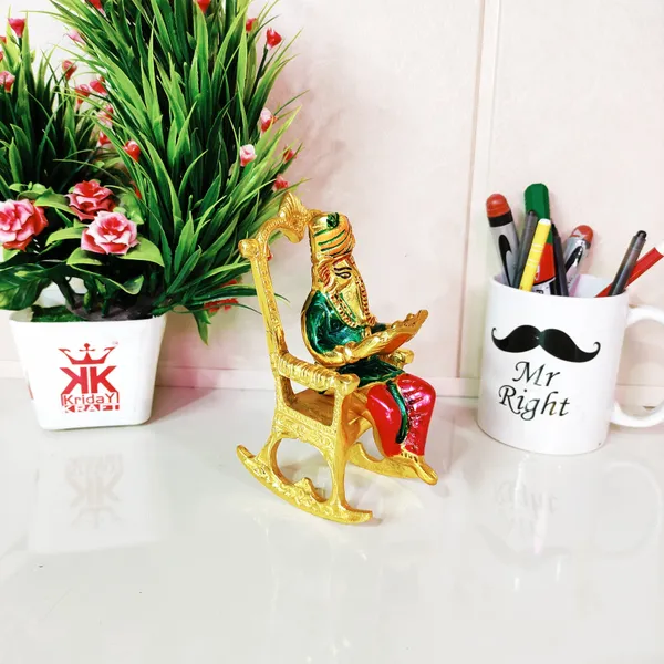 Modern_Chair_Ganesha_Metal_Staue_Reading_Ramayan_With_Meenakari_Work_Showpiece_For_Home