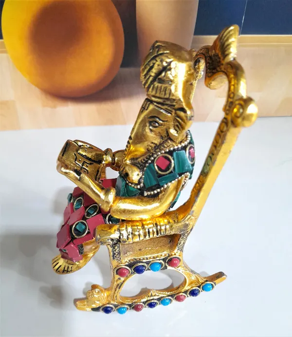 Modern_Chair_Ganesha_Metal_Staue_Reading_Ramayan_With_Stone_Work_Showpiece_For_Home