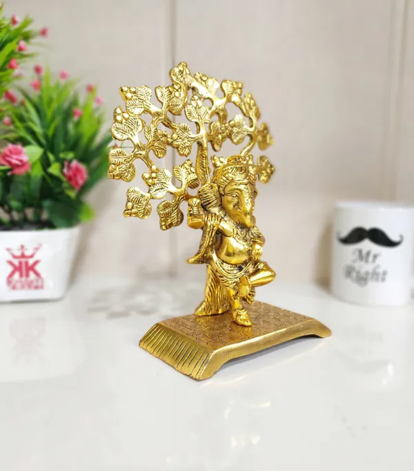 Metal_Ganesha_Statue_Playing_Damru_Standing_Under_Tree