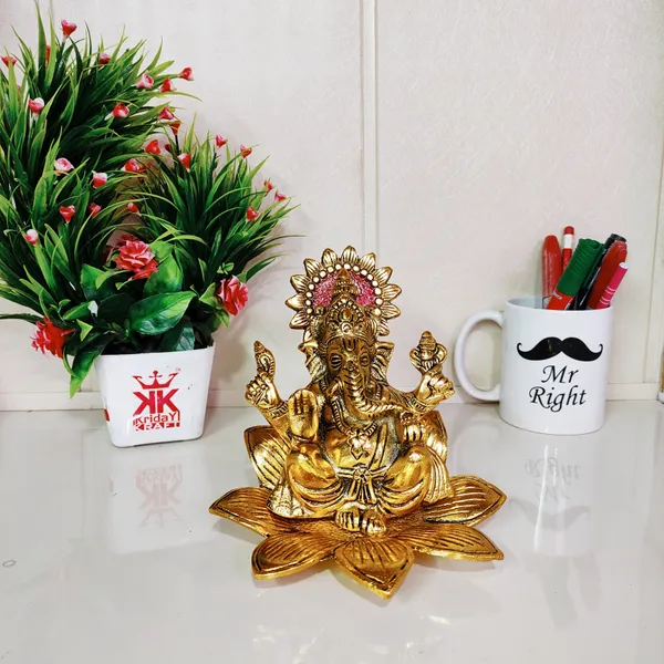 Metal_Ganesh_Sit_On_Flower_Gold_Color_Leaf_For_Pooja