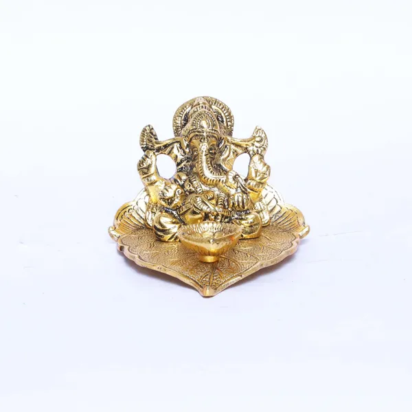 Ganesha_On_Leaf_With_Diya_Metal_Statue