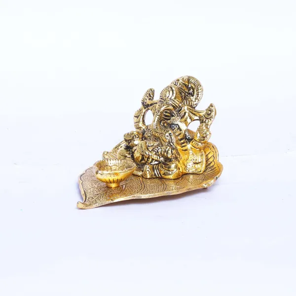 Ganesha_On_Leaf_With_Diya_Metal_Statue