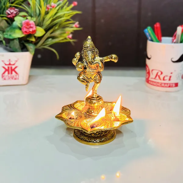 Metal_Panch_Mukhi_Diya_with_Dancing_Ganesha_Idols_Gold_Plated_for_Home_and_Office_Pooja_Room_Decoration_5_batti_Diya