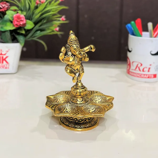 Metal_Panch_Mukhi_Diya_with_Dancing_Ganesha_Idols_Gold_Plated_for_Home_and_Office_Pooja_Room_Decoration_5_batti_Diya