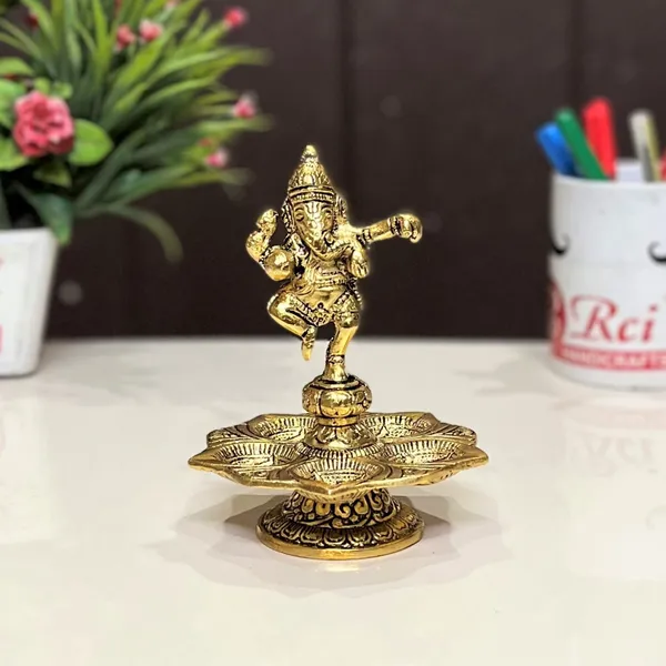 Metal_Panch_Mukhi_Diya_with_Dancing_Ganesha_Idols_Gold_Plated_for_Home_and_Office_Pooja_Room_Decoration_5_batti_Diya