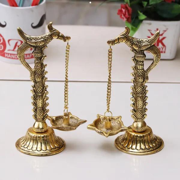 Peacock_Design_Metal_Hanging_with_Chain_Diya_Pair_of_Peacock_Design_Bird_Diya_Deepak_Oil_Lamp_Metal_Gold_Finish_Hanging_Diya_Pair_Puja(Pack_of_2)