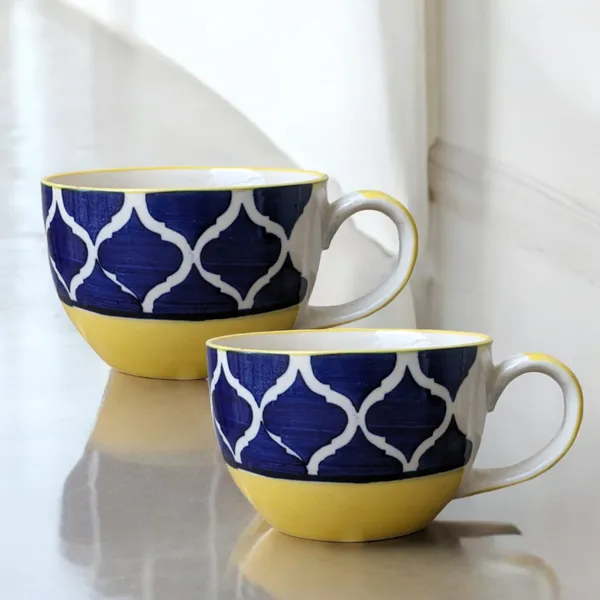 https://d1311wbk6unapo.cloudfront.net/NushopCatalogue/tr:f-webp,w-600,fo-auto/Madarks_Pack_of_2_Ceramic_Handmade_Jumbo_Coffee___Soup_Mug_Microwave_and_Dishwasher_Safe_400_ml____Blue__Cup__429UVKJ9JA_2024-07-30_1.jpeg__Madarks