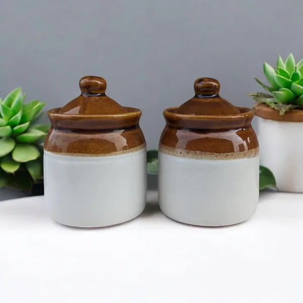 https://d1311wbk6unapo.cloudfront.net/NushopCatalogue/tr:f-webp,w-600,fo-auto/Madarks_Pack_of_2_Rustic_Two_Tone_Mini_Ceramic_Canisters__4_Inches_Height__200ml_XY8RTZ0RXF_2024-08-02_1.jpeg__Madarks