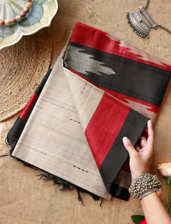 Nirja_Black_–_Lotus_Aesthetic_Edit_for_You_|_Soft_Tussar_Silk_Saree_with_Print,_Border_&_Contrast_Print_Blouse_with_Tassels