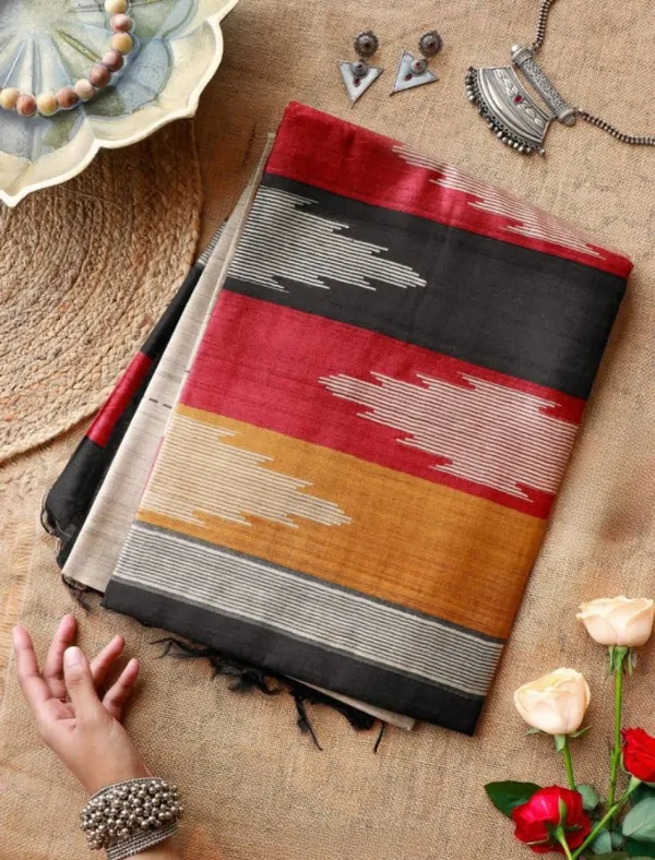 Nirja_Black_–_Lotus_Aesthetic_Edit_for_You_|_Soft_Tussar_Silk_Saree_with_Print,_Border_&_Contrast_Print_Blouse_with_Tassels