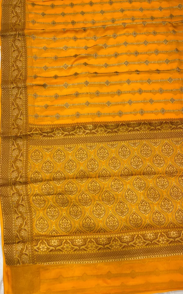 Humairah_Presents_Pure_Handloom_Mustard_Chiffon_Copper_Stripe_Booti_Jaal_with_Resham_Mina_Zari_Border_and_Mustard_Blouse
