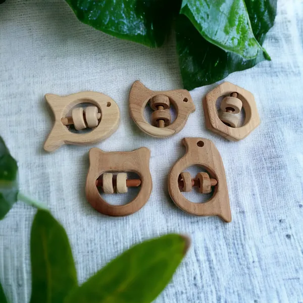 Set_of_5_Satisfying_Sound_Making_Rattles_-Sparrow,_Dove,_Fish,_Hippo_&_Hexagon_Shapes-made_up_of_pure_neem_wood
