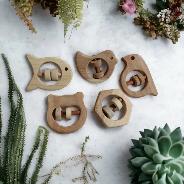 Set_of_5_Satisfying_Sound_Making_Rattles_-Sparrow,_Dove,_Fish,_Hippo_&_Hexagon_Shapes-made_up_of_pure_neem_wood