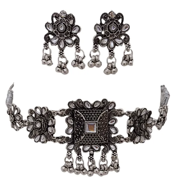 https://d1311wbk6unapo.cloudfront.net/NushopCatalogue/tr:f-webp,w-600,fo-auto/Oxidized_Style_Black_Antique_Plated_Kundan_Choker_Jewellery_Set_9ZBGEQMERX_2024-07-25_1.png__Evy