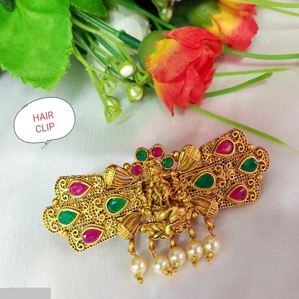 https://d1311wbk6unapo.cloudfront.net/NushopCatalogue/tr:f-webp,w-600,fo-auto/PADMAWATIBANGLES_TRADITIONAL_SOUTH_LAXMI_DESIGN_HAIRCLIP_FOR_WOMEN_AND_GIRLS._RKPBEYOA2G_2022-08-18_1.jpg__Padmawati Bangles   Private Limited