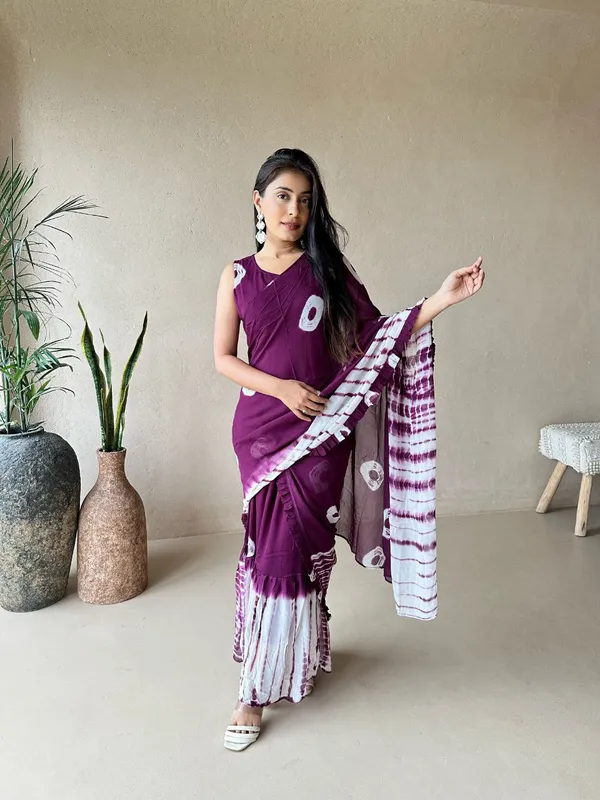 https://d1311wbk6unapo.cloudfront.net/NushopCatalogue/tr:f-webp,w-600,fo-auto/Purple_Tie_Dye_Gown_Saree_9JRVXN2KHP_2024-07-18_1.jpg