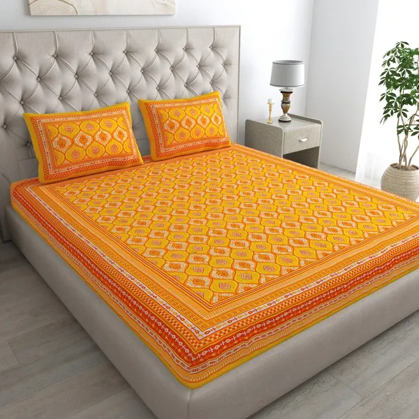 https://d1311wbk6unapo.cloudfront.net/NushopCatalogue/tr:f-webp,w-600,fo-auto/Rajasthani_Print_Cotton_Double_Bedsheet_with_2_Pillow_Covers___Pack_of_1__Yellow___2Y1Z9F0IF3_2024-07-23_1.jpeg__Pink City