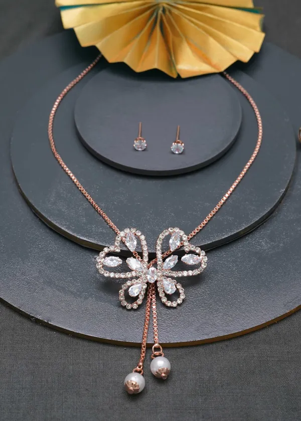 Gold_Butterfly_Shape_Ad_Diamond_Stone_Studs_Designer_Necklace_Set_For_Women