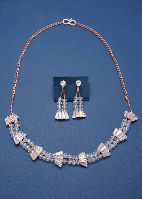 Gold_Designer_Ad_Diamond_And_Crystal_Pearl_Studs_Necklace_Set_For_Women