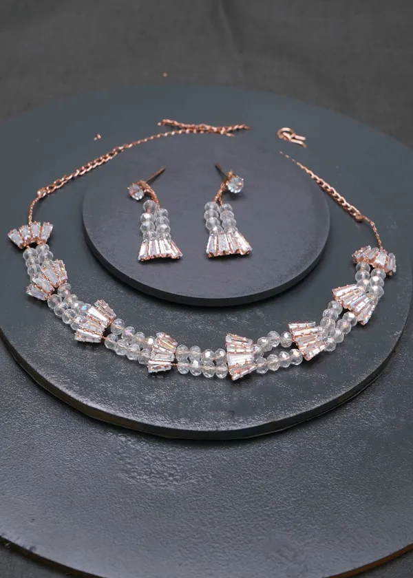 Gold_Designer_Ad_Diamond_And_Crystal_Pearl_Studs_Necklace_Set_For_Women