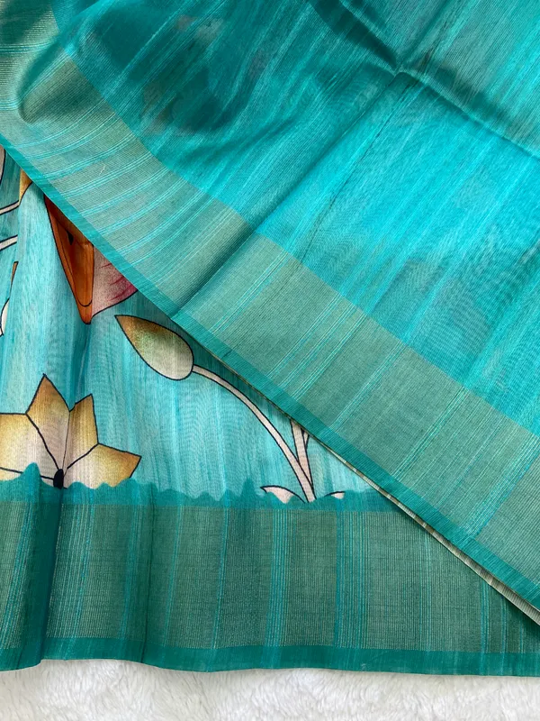 Darika_Rama_Green_–_Navratri_Special_|_Soft_Tussar_Silk_Saree_with_Print,_Pallu_&_Zari_Border_&_Contrast_Print_Blouse_with_Tassels