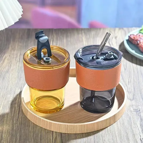 Glass_Tumbler_with_Silicone_Straw_and_Lid_435ml,_Pack_of_2_Glass_Cup_with_Leather_Sleeve,_Glass_Coffee_Mugs_for_Straw_and_Direct_Drinking_Mouth_Dual_Use,_Summer_Travel_Essential_Bottle_(Amber_+_Black)