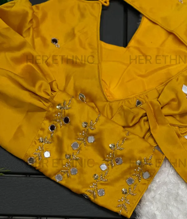 Yellow_Real_Mirror_And_Handwork_Blouse_With_Heavy_Bow_Style_Pattern_And_Beautiful_Tassels
