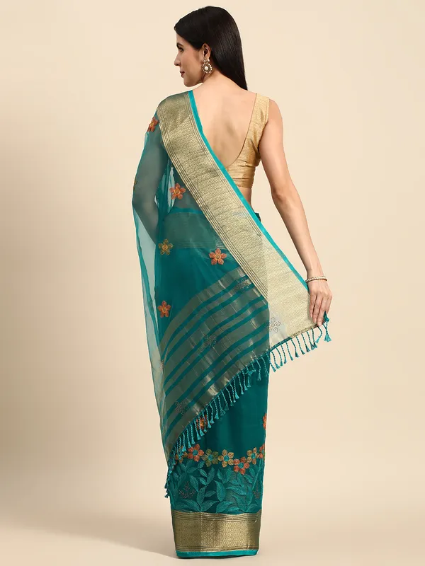 Indian_Women_Turquoise_Blue_Orgenza_Fancy_border_with_Embroidery_work