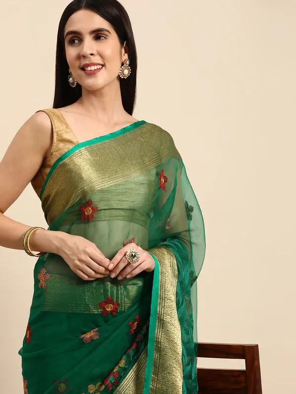 Indian_Women_Turquoise_Green_Orgenza_Fancy_border_with_Embroidery_work
