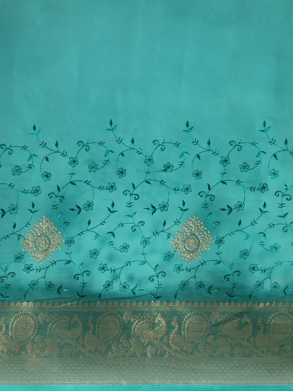 Indian_Women_Turquoise_Blue_Orgenza_Fancy_border_with_Embroidery_work