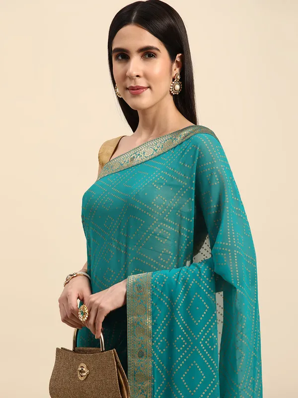 Indian_Women_Turquoise_Green_Georgette_Foil_with_Swarovski_work