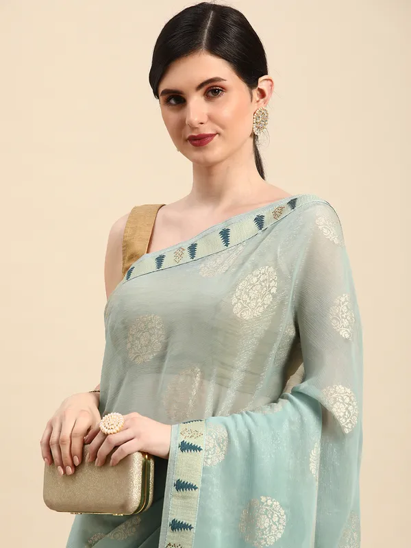Indian_Women_Turquoise_Blue_Shimmer_Chiffon_Fancy_Border_with_Swarovski_&_foil_work
