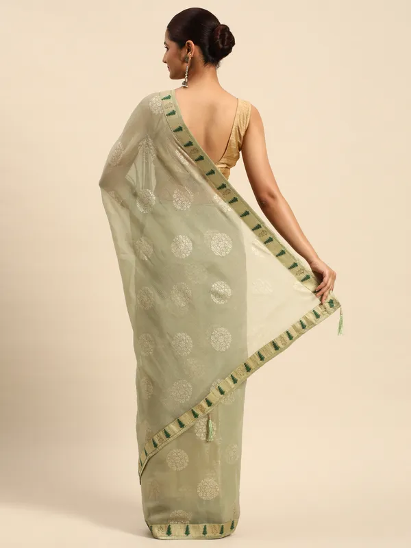 Indian_Women_Lite_Green_Shimmer_Chiffon_Fancy_Border_with_Swarovski_&_foil_work